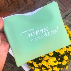 Silicone Makeup Bag - prettiest shade of green.  Will wipe clean super easy.